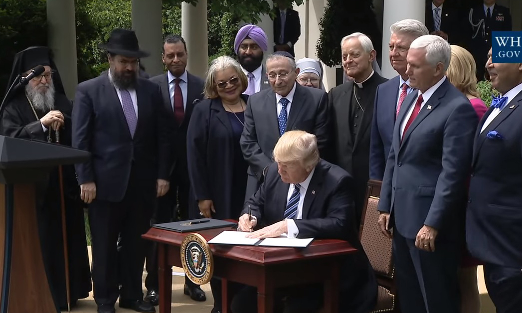 President Donald Trump signed an executive order to protect faith beliefs and practice in a ceremony May 4.