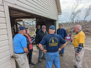 IBDR volunteers talk with homeowners in Mayfield, KY. Photo courtesy Emily Allen McEwen.