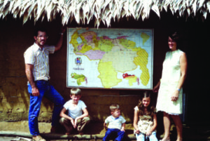Former missionaries stand in front of a map of Venezuela with their three children in the 1990s. One of their sons, Skip Meyer*, now serves in South Asia. His knowledge of Latino culture and the Spanish language enables him to mobilize Hispanics and Latinos to serve countries in South Asia that have a desperate need for the gospel. 