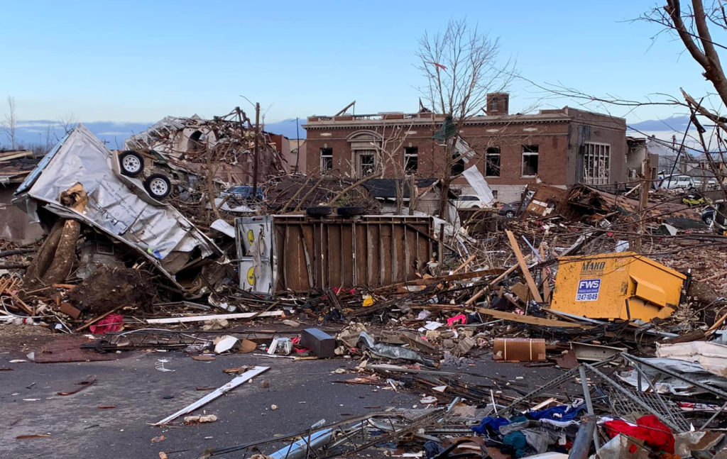 Debris is piled up in the parking lot of First Baptist Church Mayfield, Kentucky. The church building sustained significant damage in the small town where dozens were killed as tornadoes swept across six states in the wee hours of Saturday morning. (Photo submitted to Baptist Press)