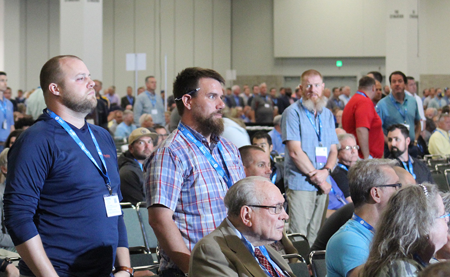 Pastors stand to vote for the 2023 Pastors' Conference President.