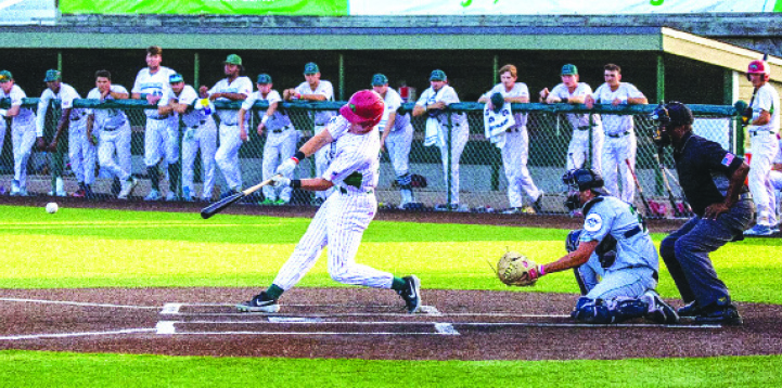 The Alton River Dragons bested the Normal Cornbelters 13-2 in the July 17 game which was sponsored by Requiem Church. The new church plant reached out to coaches, players, and local families who host them during the two-month summer season. Photo by Colin Feeney.
