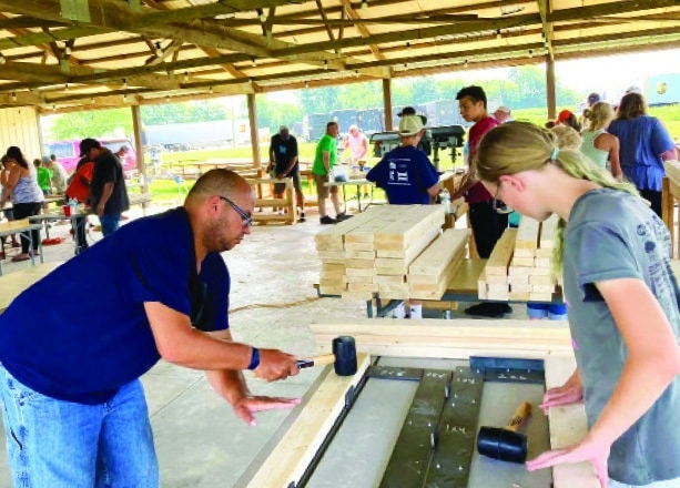 Building beds for needy kids