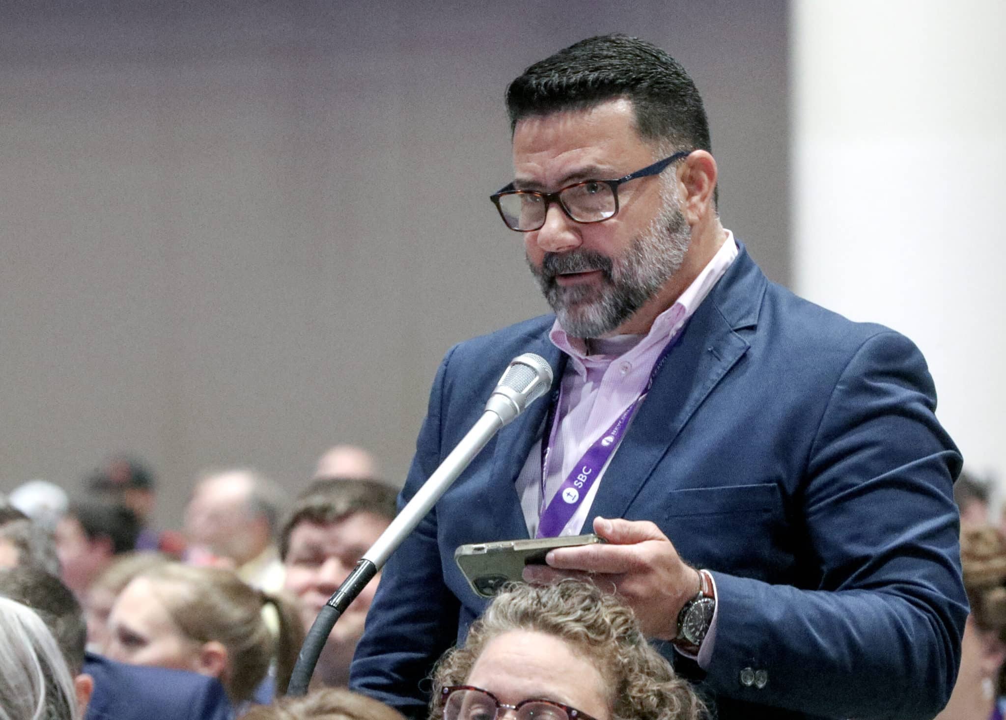 Texas pastor Juan Sanchez provided an amendment to Law's original motion. Both Sanchez' amendment and then Law's amended motion were adopted by messengers. The motion received the two-thirds vote required to be considered again next year. Another two-thirds vote will lead to a change in the SBC's constitution. Photo by Sonya Singh