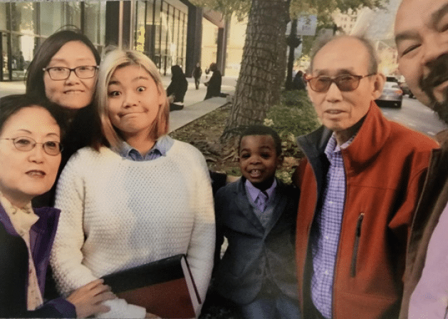 The Yi family outside the Adoption Court in Chicago.