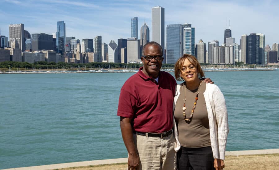 Keith and Deborah Jefferson pose for a quick portrait in front of the Chicago skyline.